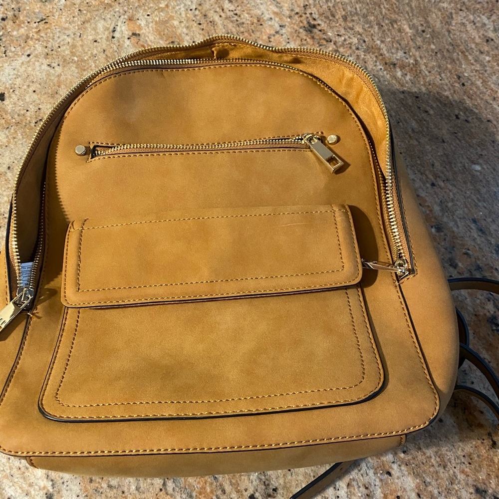 Suede GAP backpack purse never used good condition